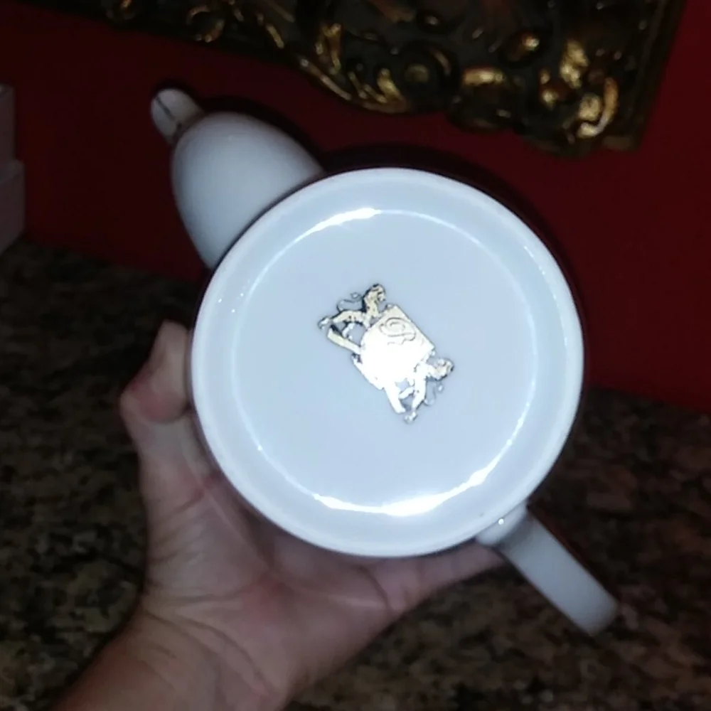 Elegant White Porcelain Teapot with Red and Gold Trim